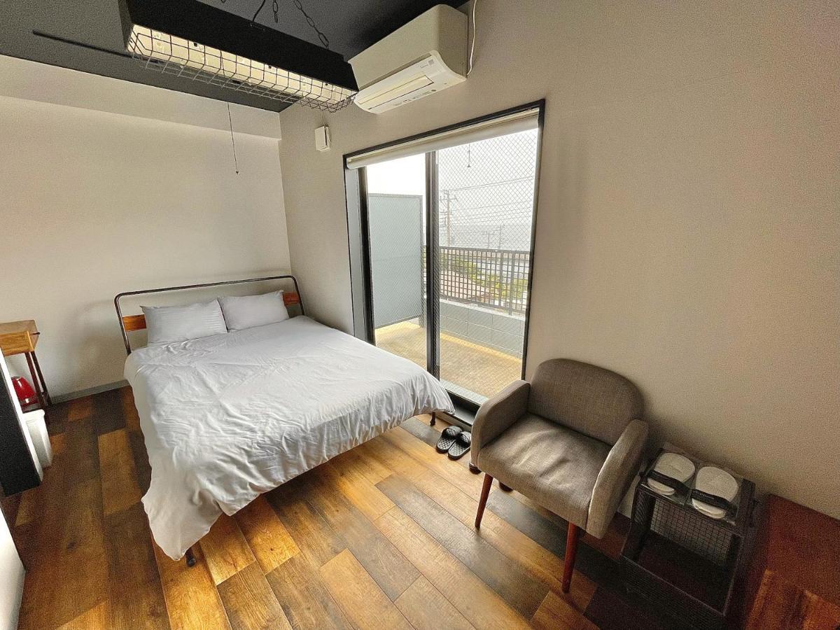 Отель Book Tea Bed Izuoshima Экстерьер фото