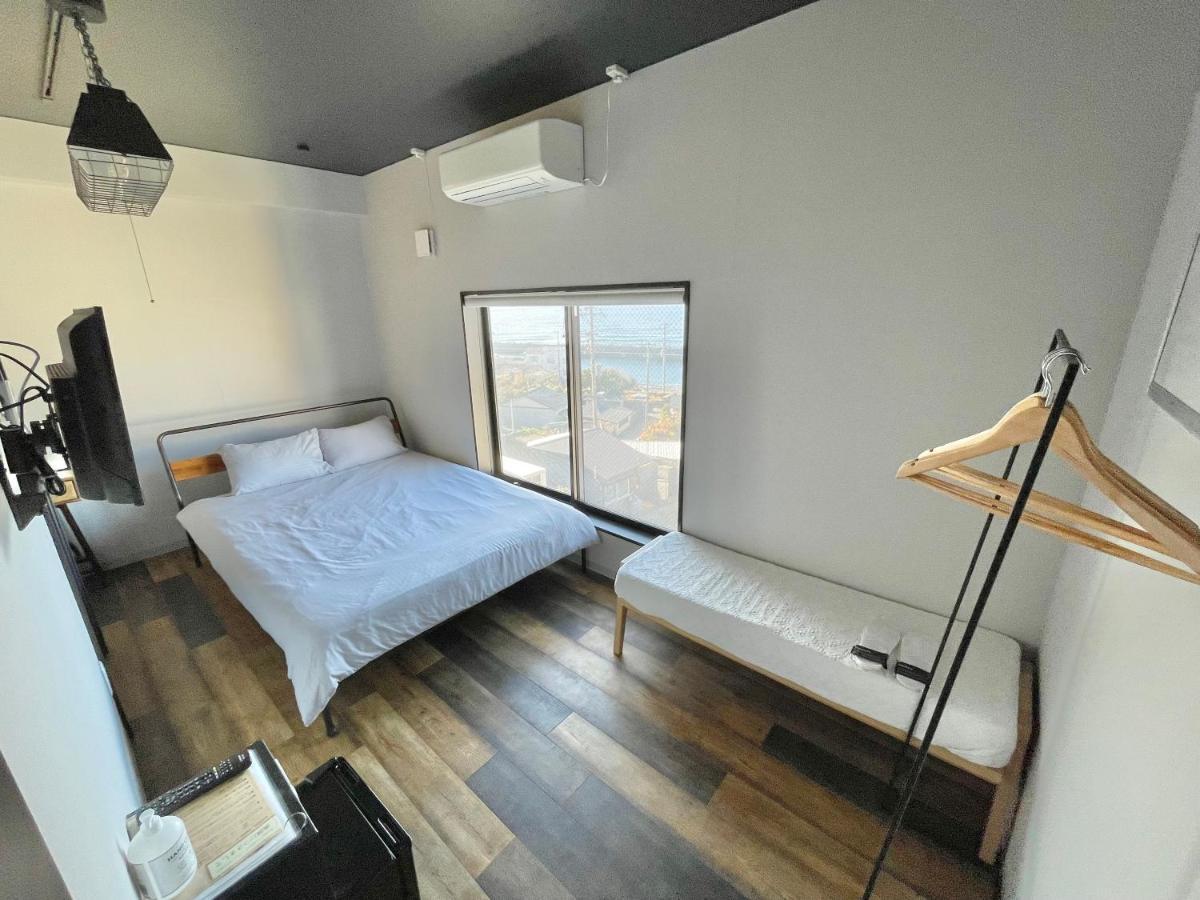 Отель Book Tea Bed Izuoshima Экстерьер фото